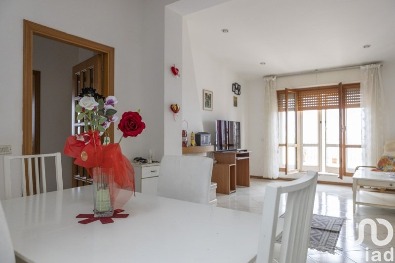 Многоквартирный дом в Озимо