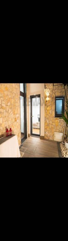 Особняк в Ачи-Кастелло