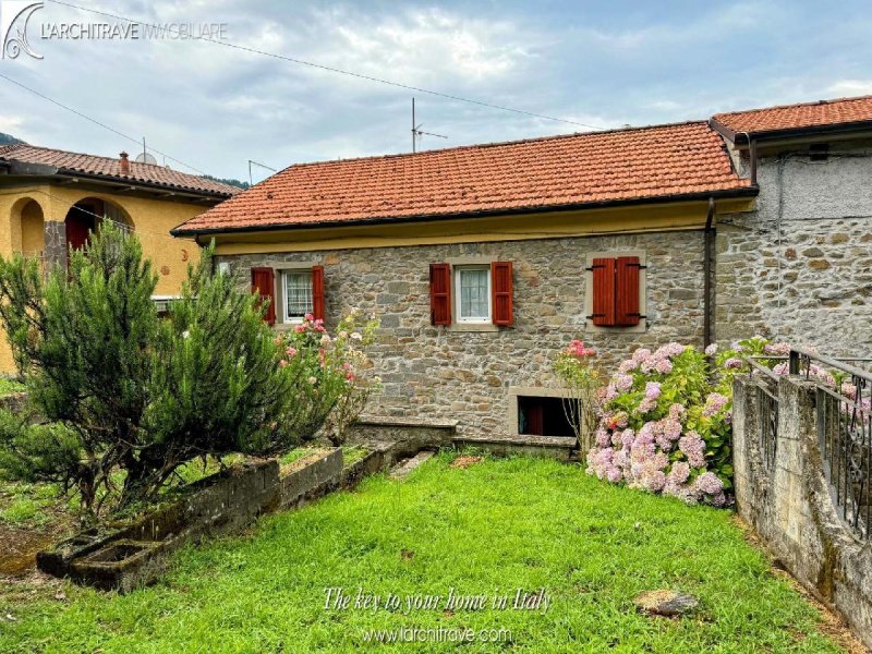 Maison jumelée à Comano