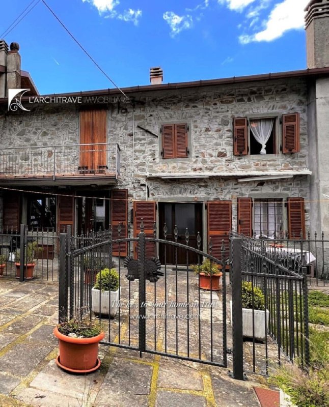 Casa geminada em Comano