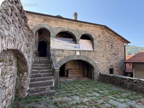 Casa geminada em Comano