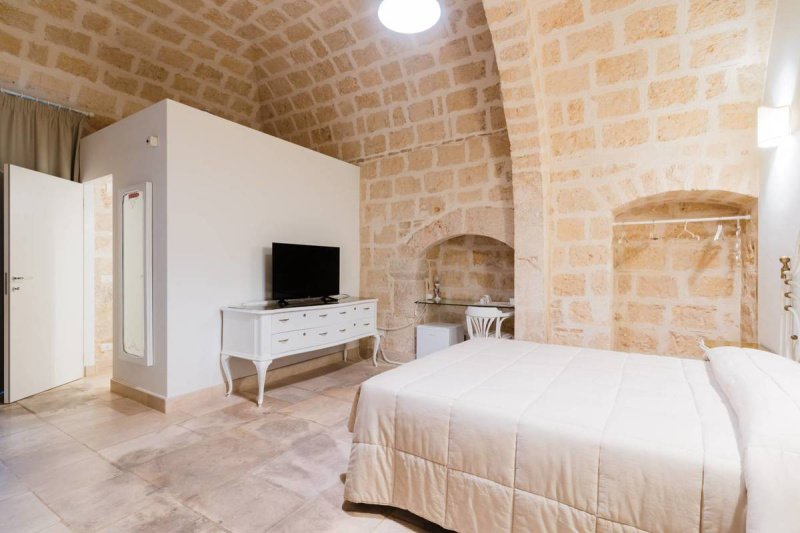 Многоквартирный дом в Корато