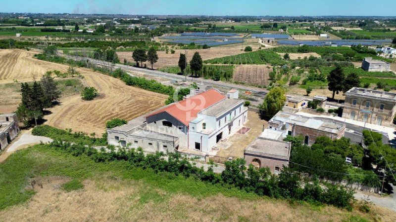 Bedrijfspand in Carmiano